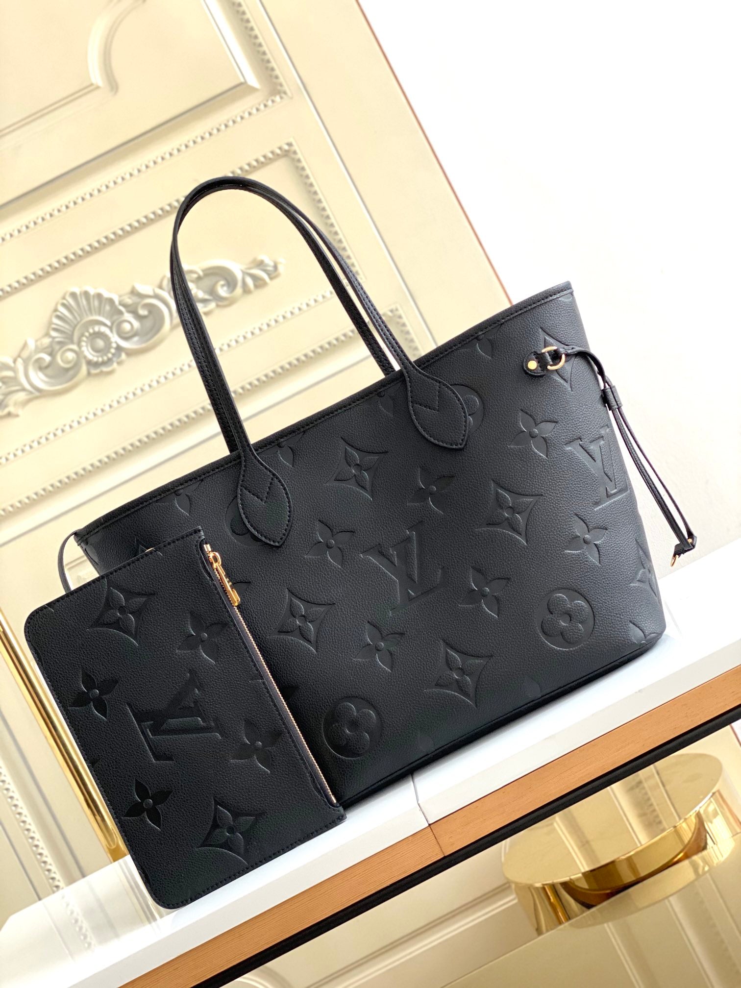 Louis Vuitton Elegant Black Embossed Leather Tote Bag with Double Handles