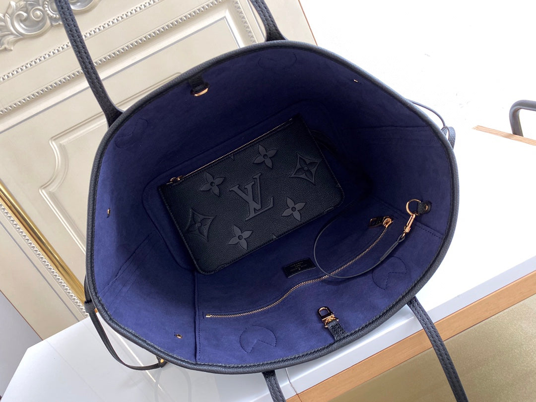 Louis Vuitton Elegant Black Embossed Leather Tote Bag with Double Handles