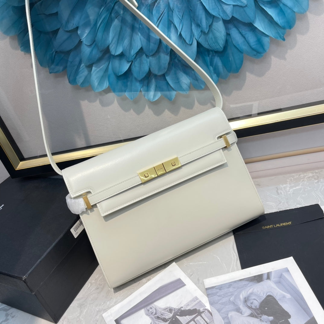 Elegant Women's Cream Leather Shoulder Bag with Gold Hardware and Buckle Detail
