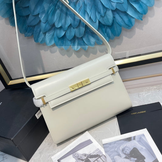 Elegant Women's Cream Leather Shoulder Bag with Gold Hardware and Buckle Detail