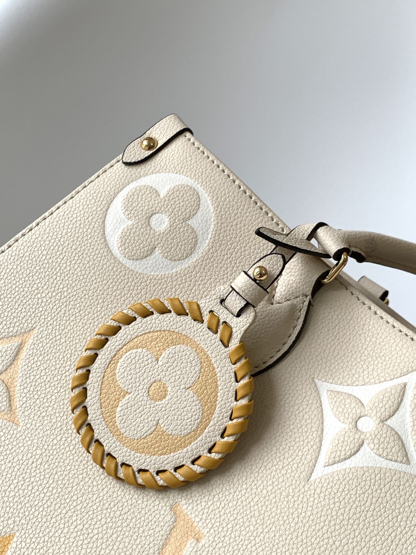 Louis Vuitton Luxury Beige Leather Tote Bag with Gold Monogram Floral Pattern
