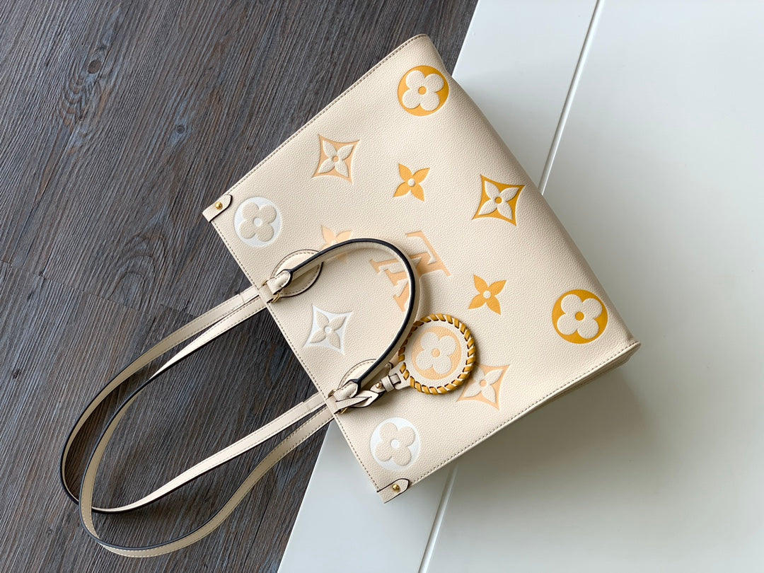 Louis Vuitton Luxury Beige Leather Tote Bag with Gold Monogram Floral Pattern