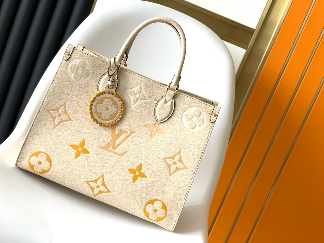 Louis Vuitton Luxury Beige Leather Tote Bag with Gold Monogram Floral Pattern