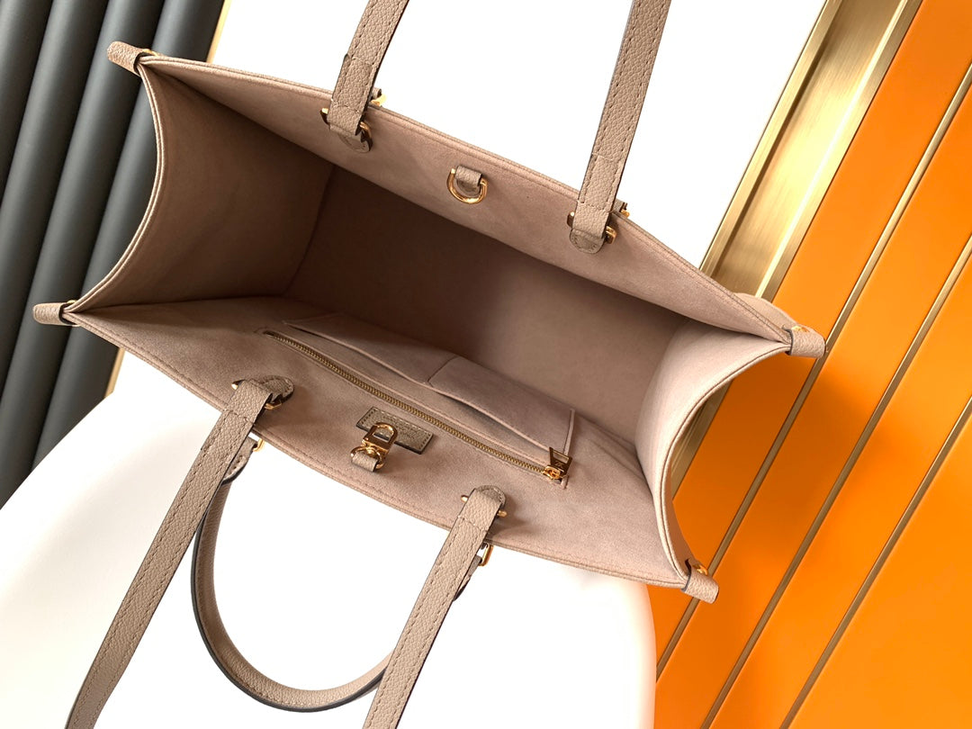 Louis Vuitton Elegant Taupe Leather Tote Bag with Large Embossed Monogram