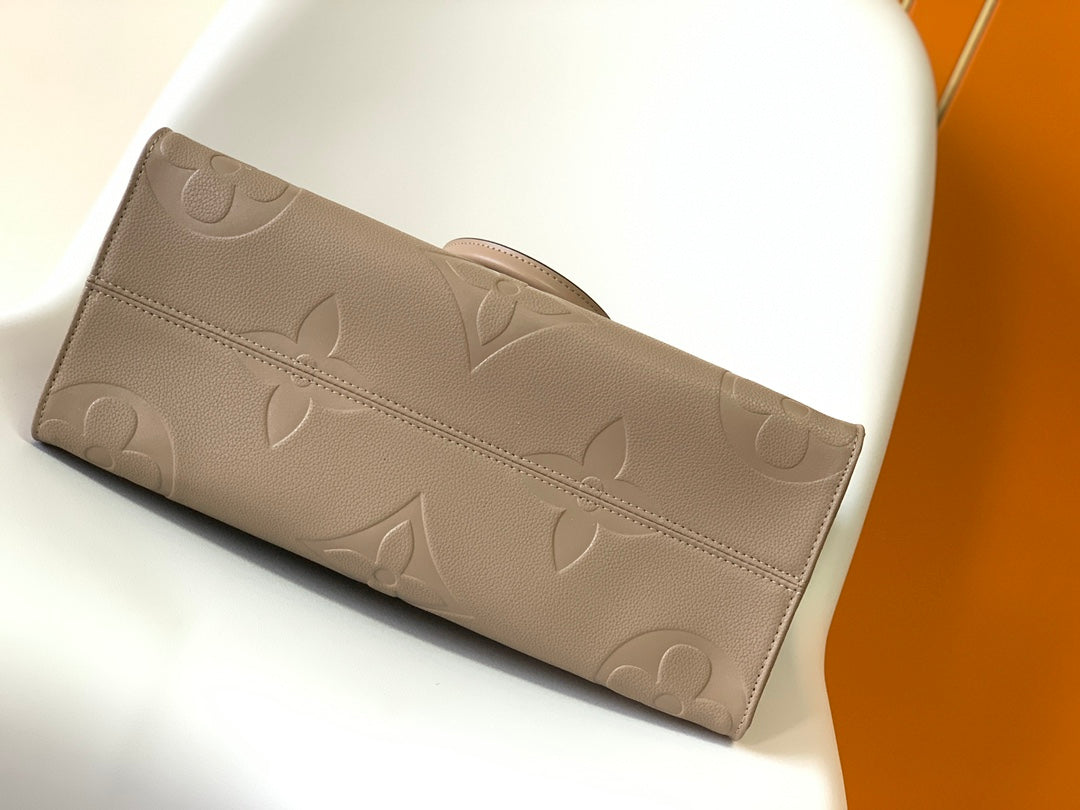 Louis Vuitton Elegant Taupe Embossed Leather Tote Bag with Top Handles