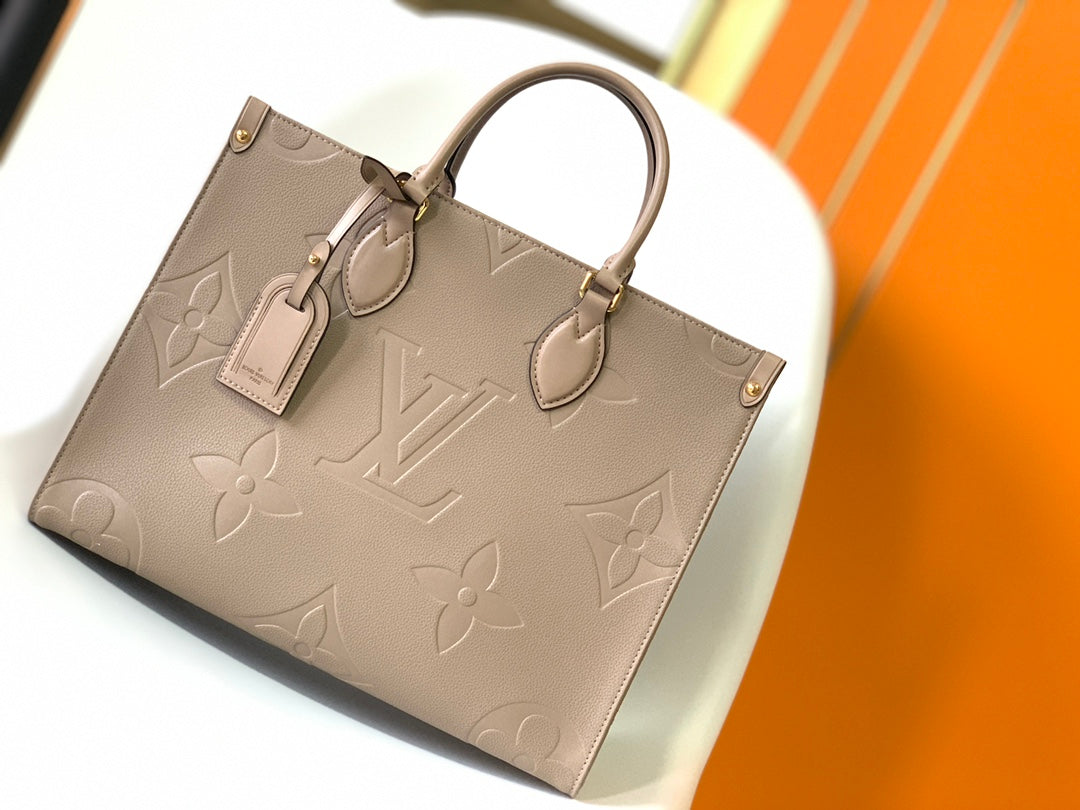 Louis Vuitton Elegant Taupe Embossed Leather Tote Bag with Top Handles