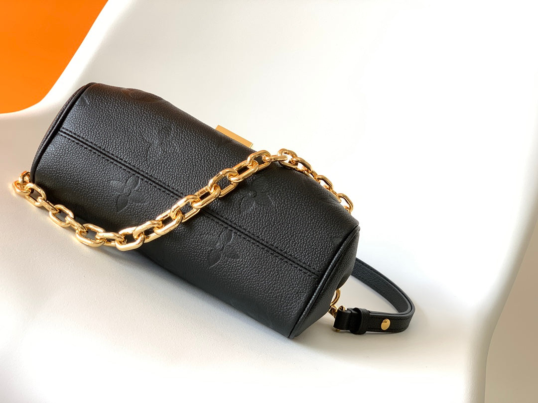 Louis Vuitton Elegant Black Embossed Leather Flap Bag with Gold Chain