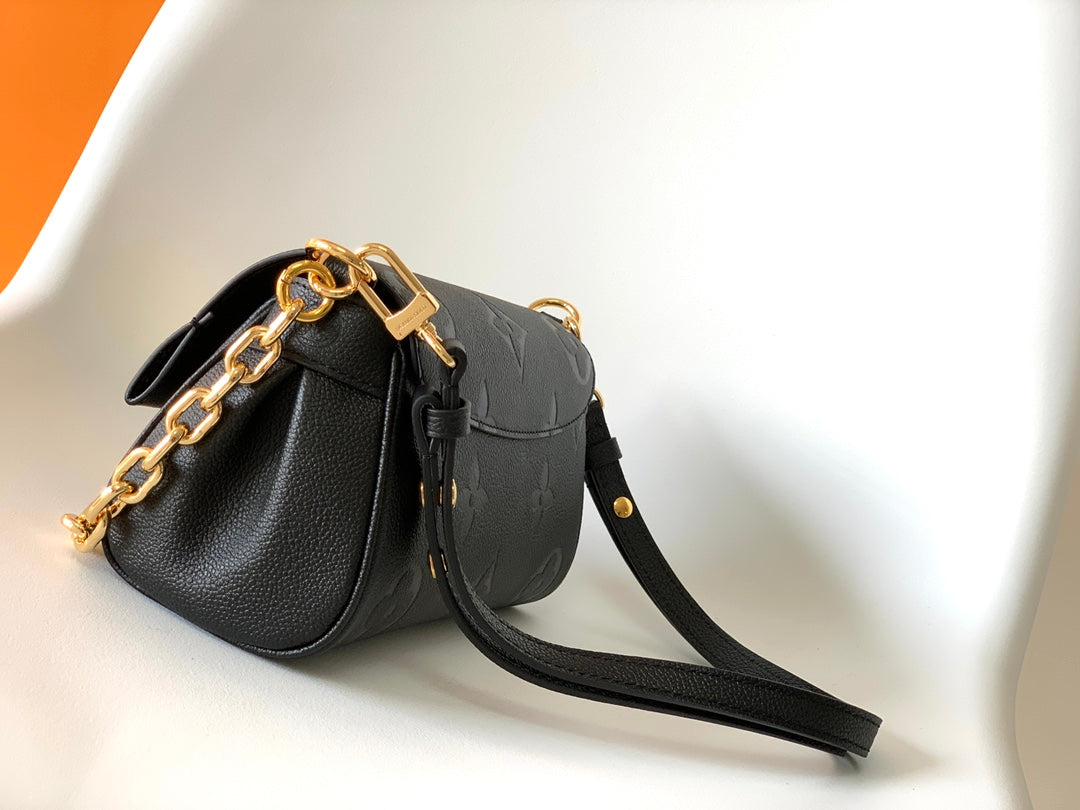 Louis Vuitton Elegant Black Embossed Leather Flap Bag with Gold Chain