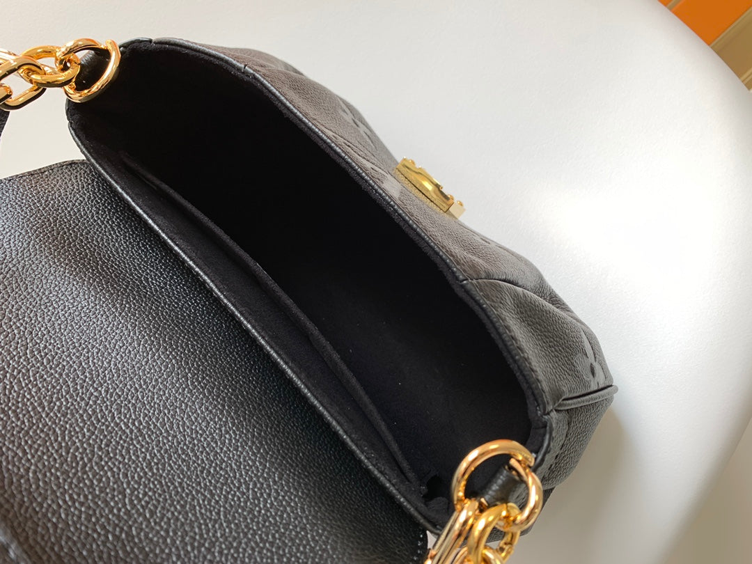 Louis Vuitton Elegant Black Embossed Leather Flap Bag with Gold Chain