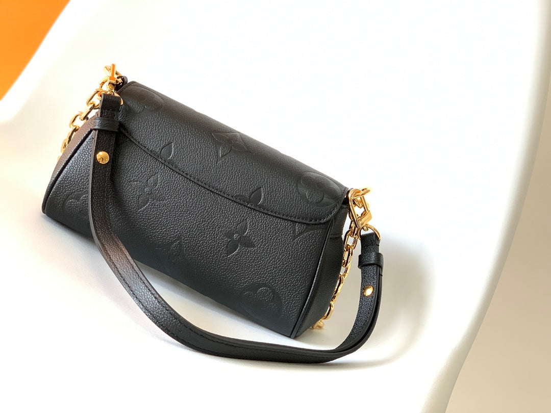 Louis Vuitton Elegant Black Embossed Leather Flap Bag with Gold Chain