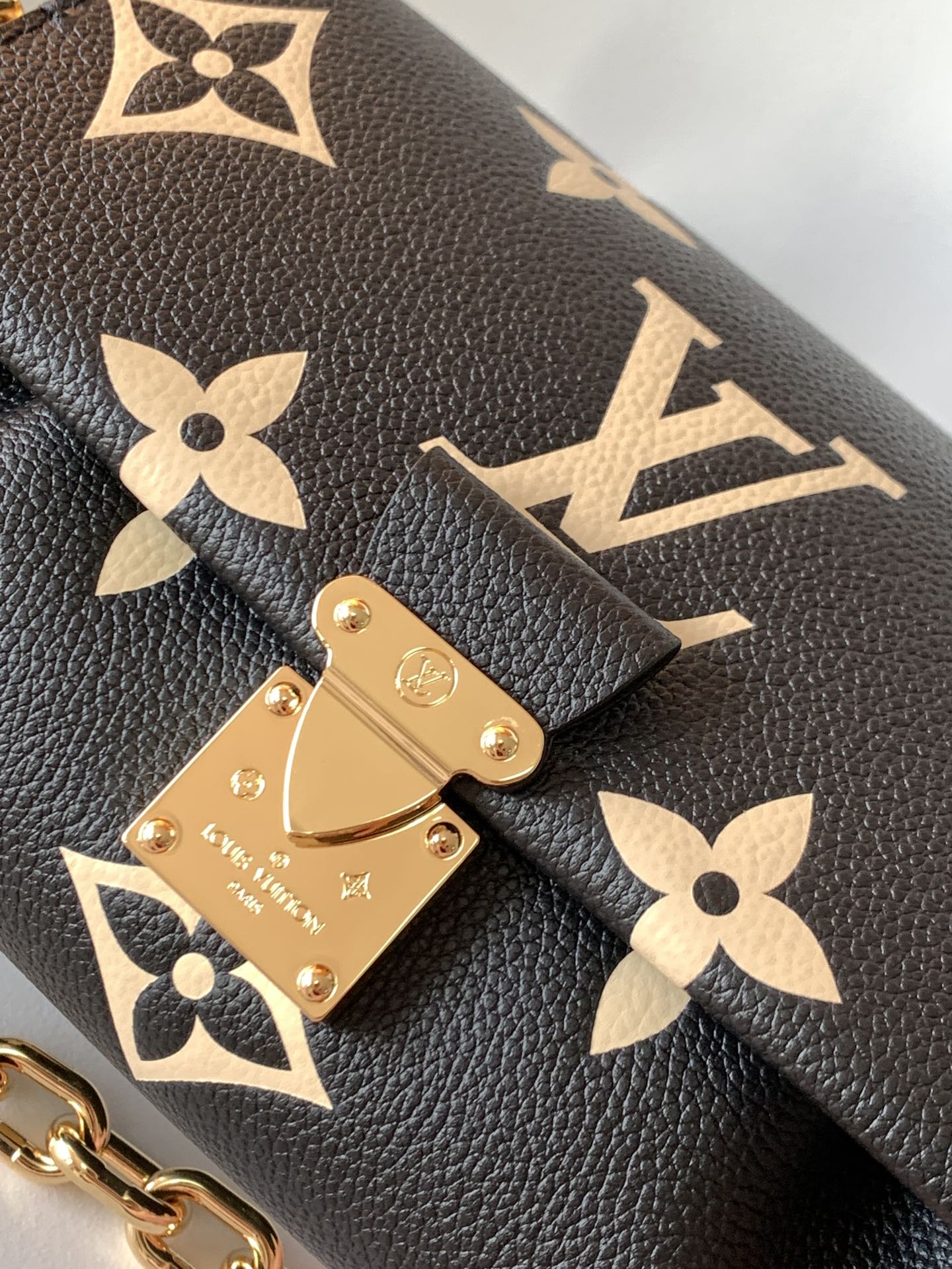 Louis Vuitton Elegant Black Leather Monogram Crossbody Bag with Gold Chain