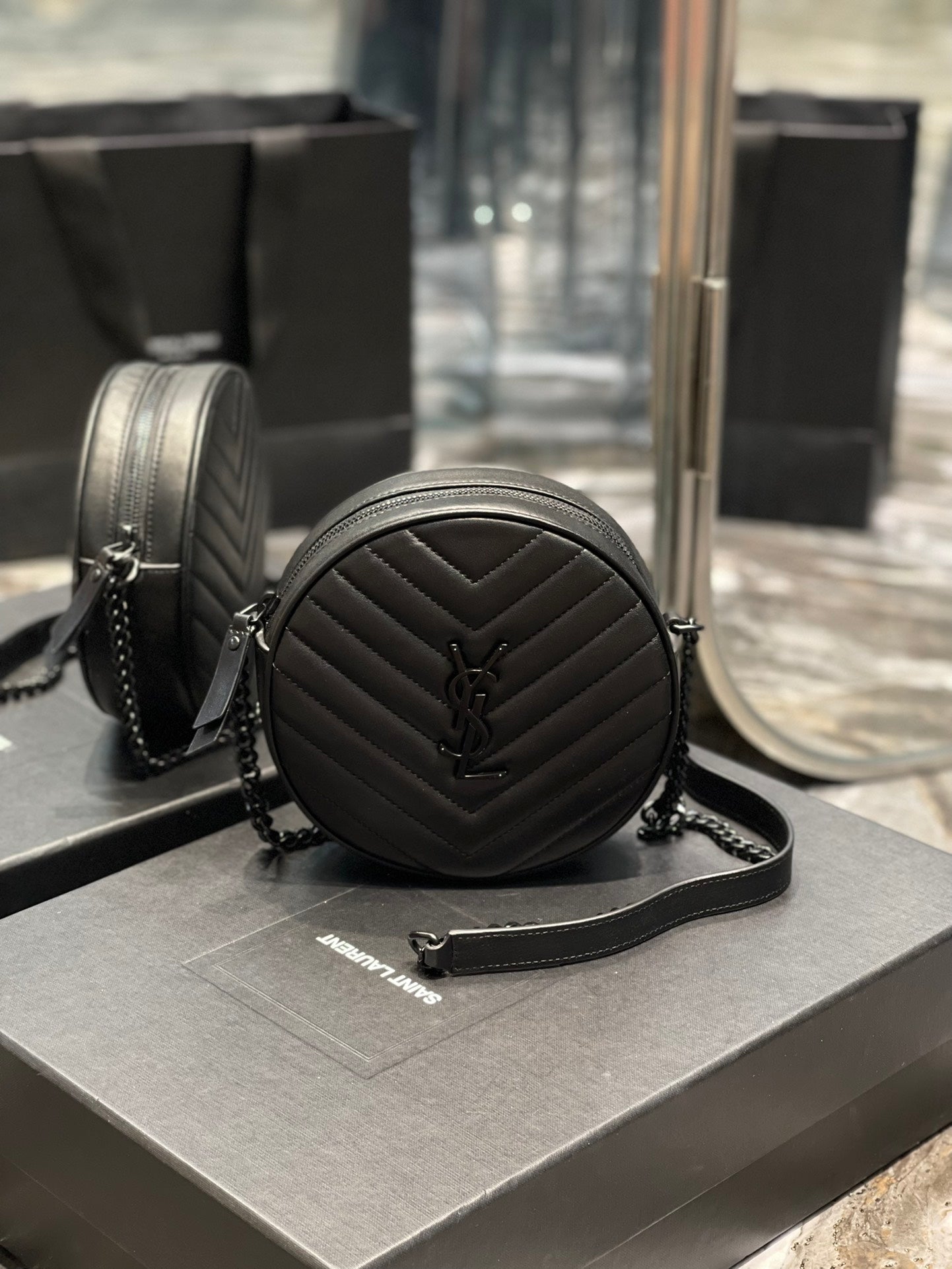 Saint Laurent Vinyle Round Camera Bag in Chevron-Quilted Leather - Black