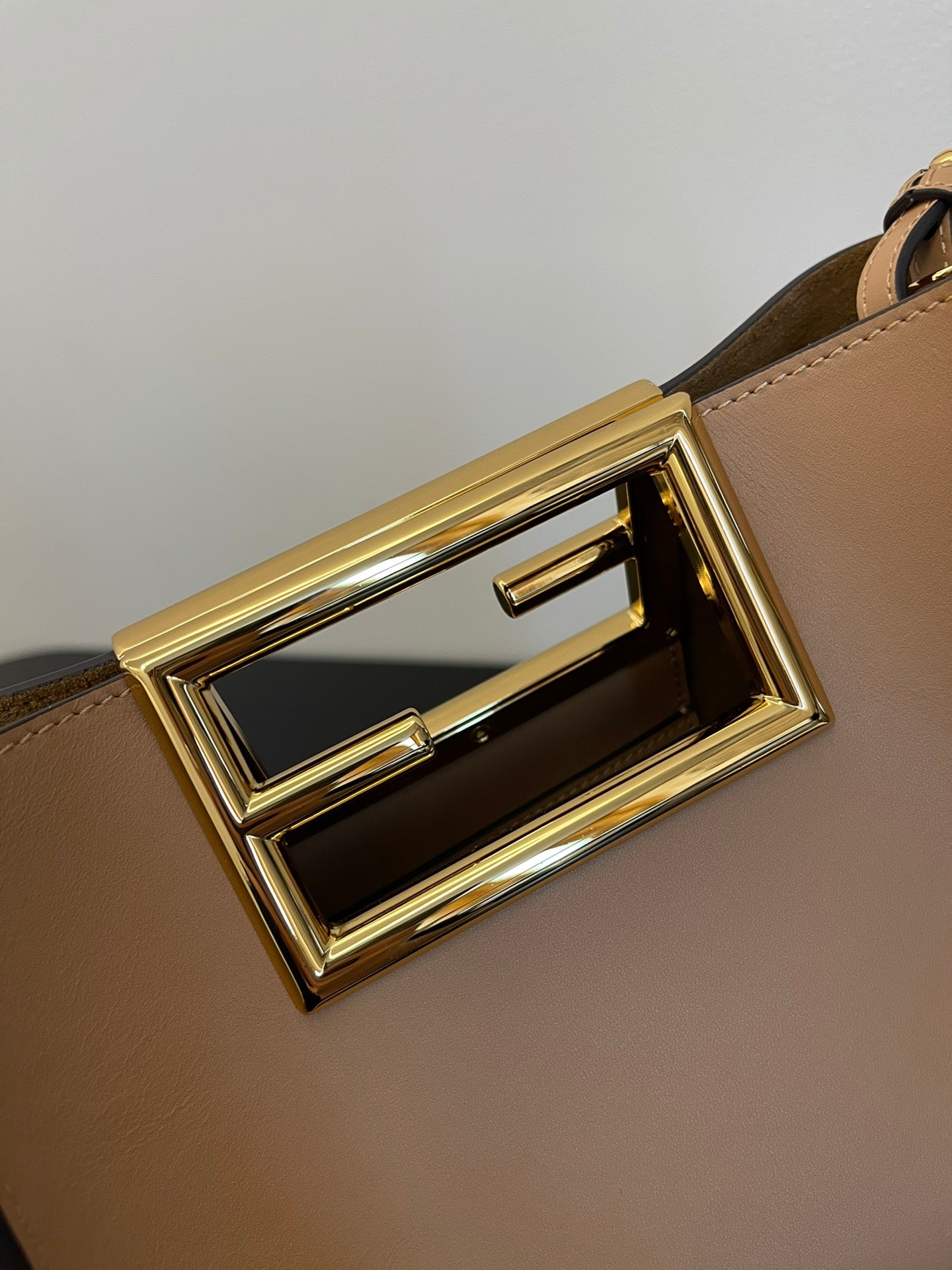 Elegant Beige Leather Handbag with Gold-Tone Cutout Handle - Small Crossbody Bucket Bag