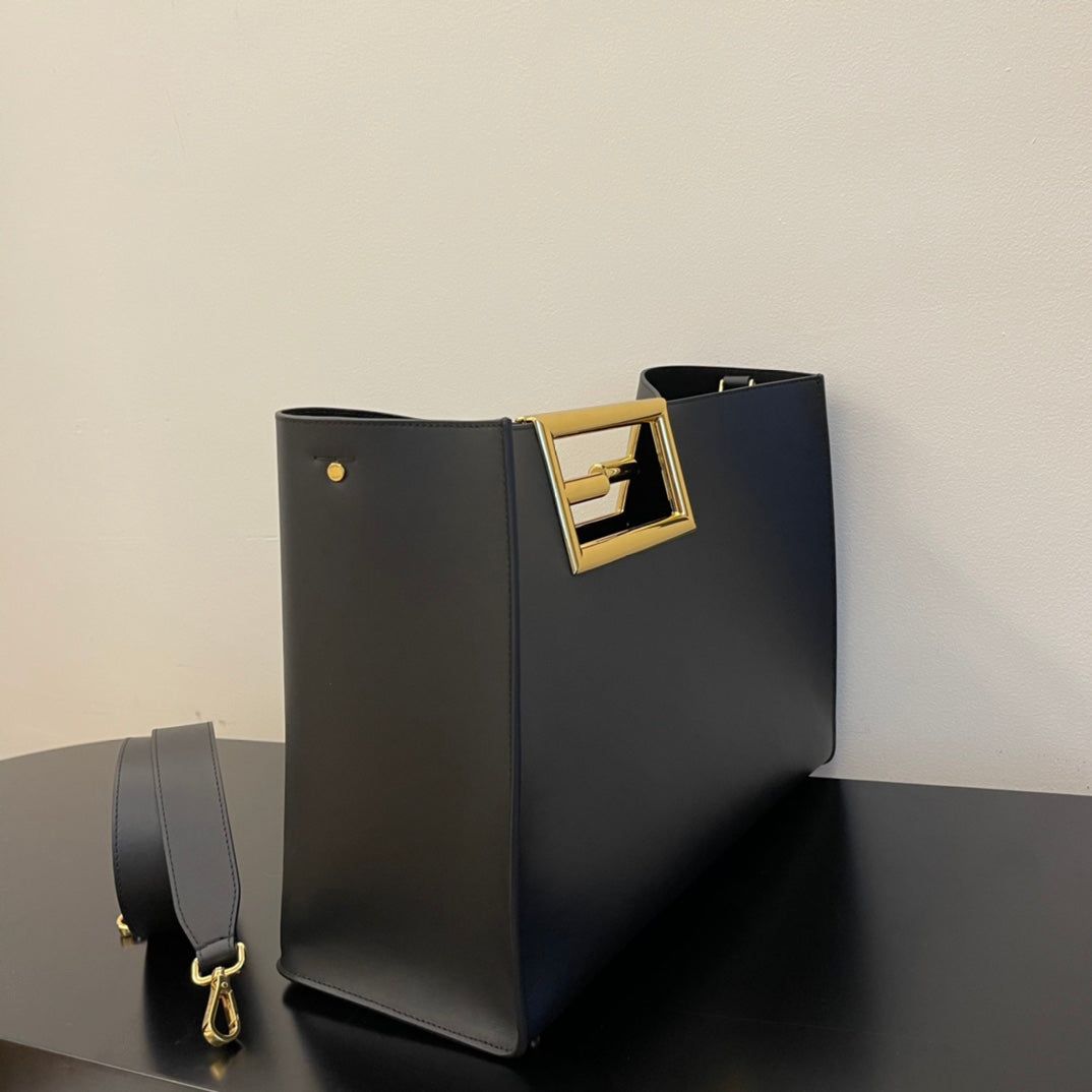 Elegant Black Leather Handbag with Gold Rectangular Clasp and Detachable Shoulder Strap