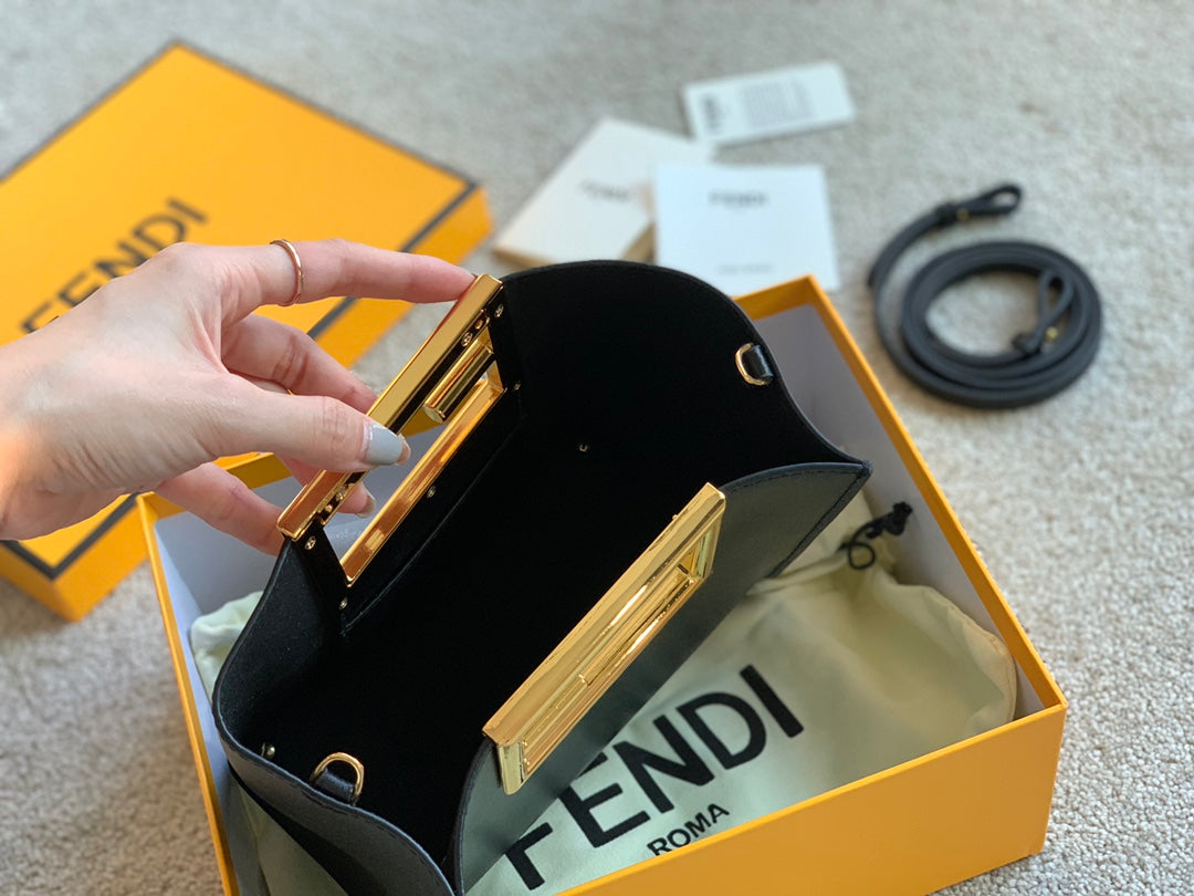 Fendi First Small Black Leather Clutch Bag with Gold-Finish Metal Handle