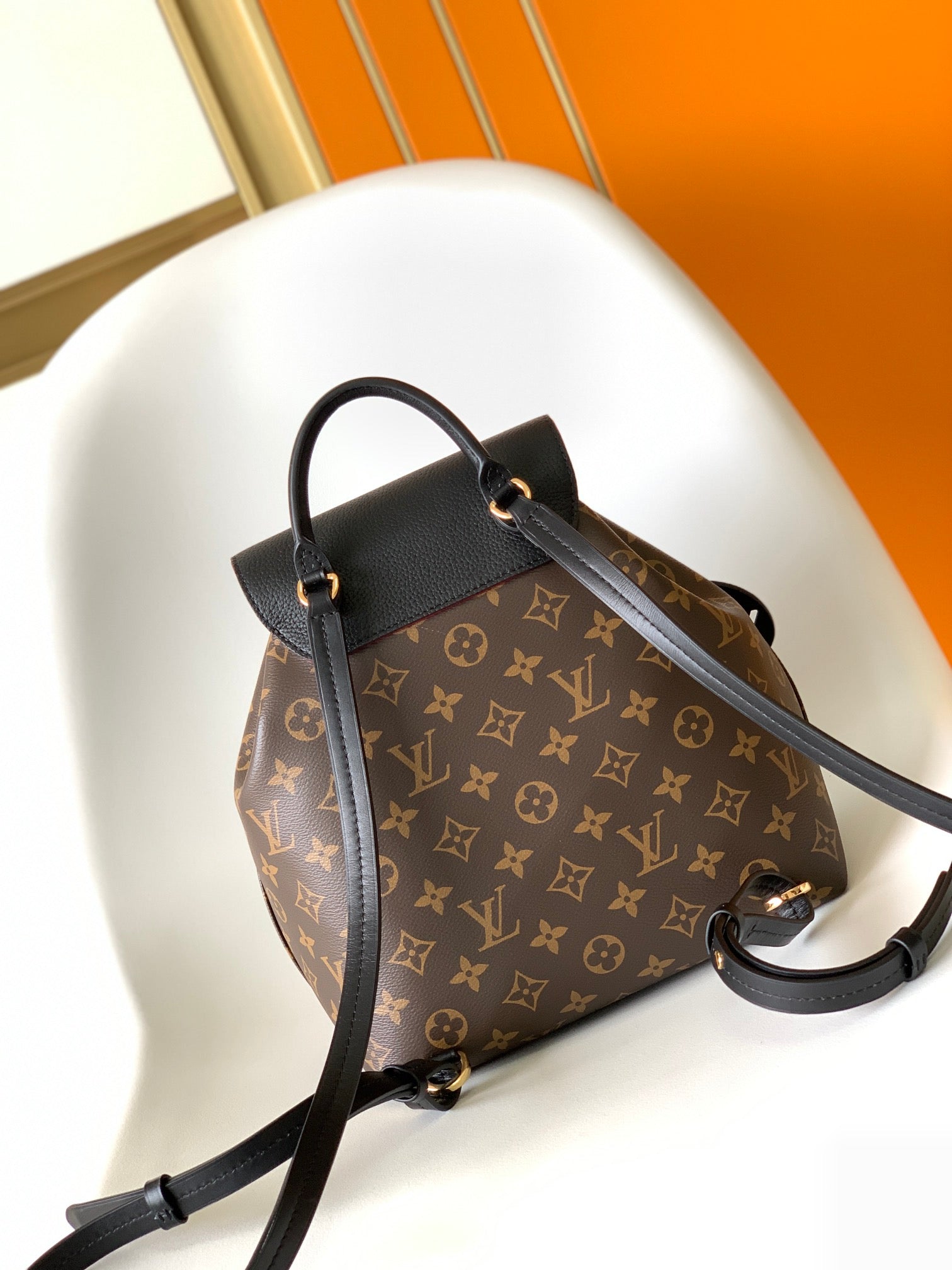 Louis Vuitton Classic Monogram Pattern Drawstring Backpack with Leather Flap