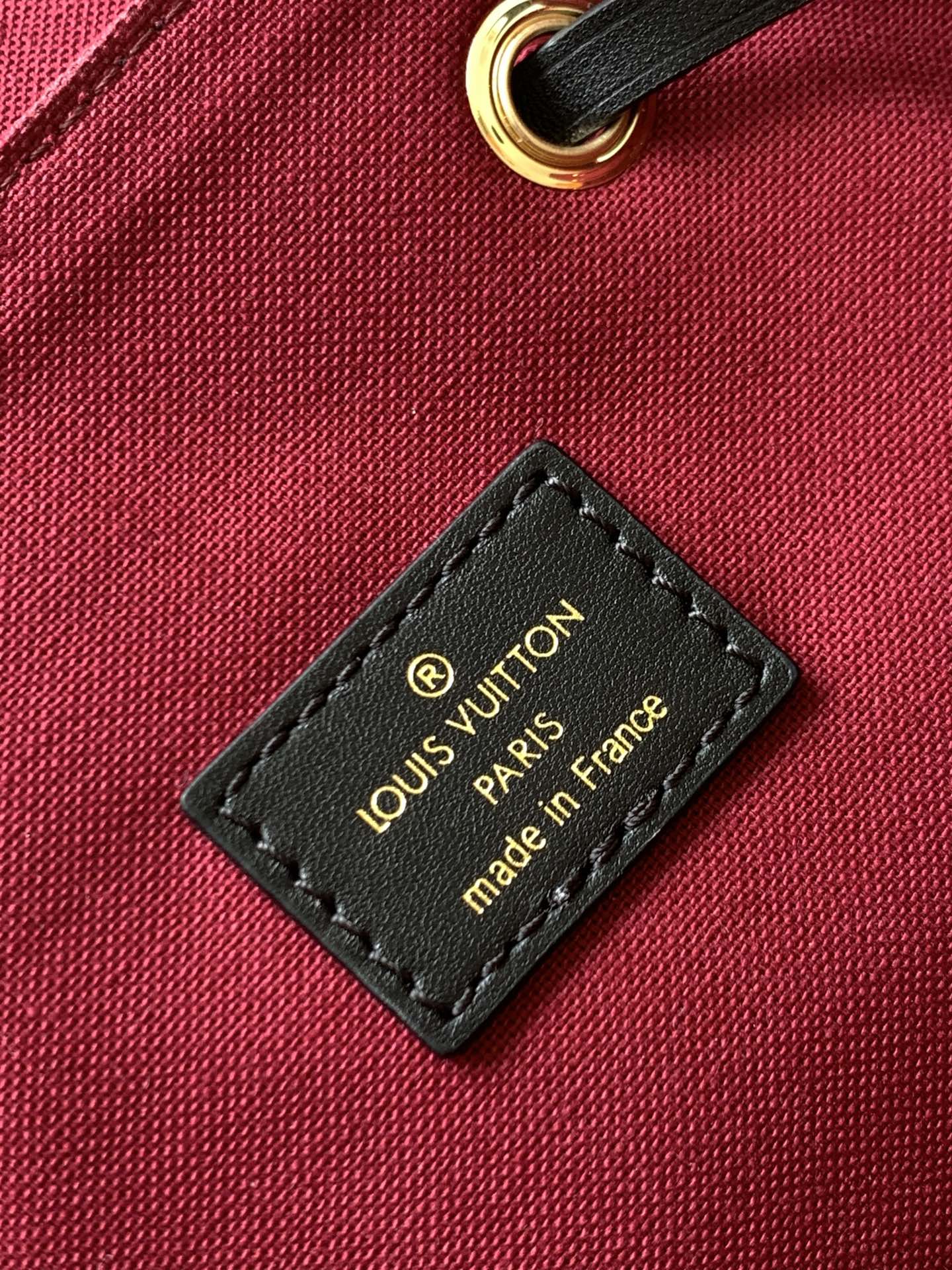 Louis Vuitton Classic Monogram Pattern Drawstring Backpack with Leather Flap