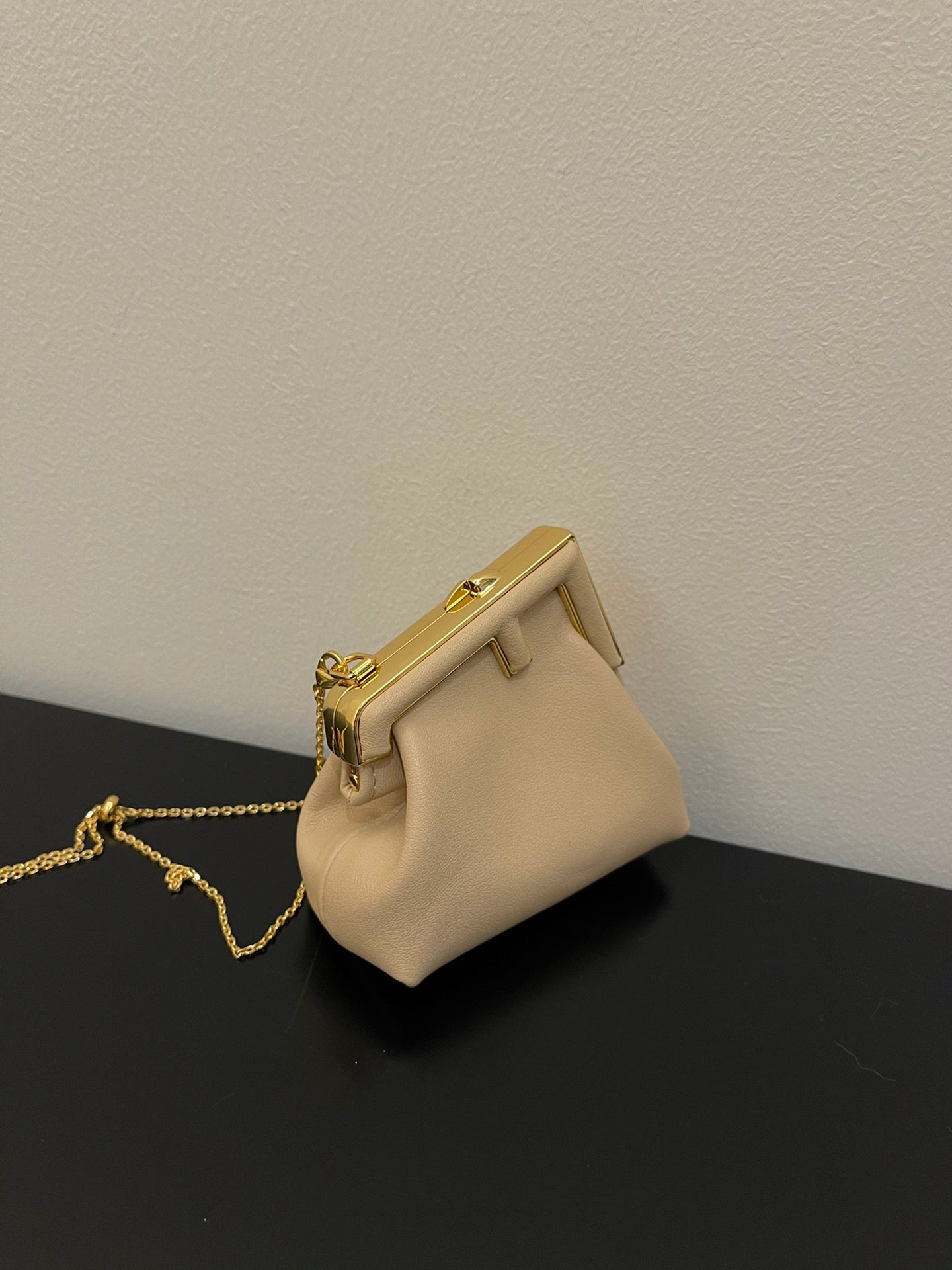 Nano Beige Leather Pouch with Gold Chain Strap and Metal Frame Closure