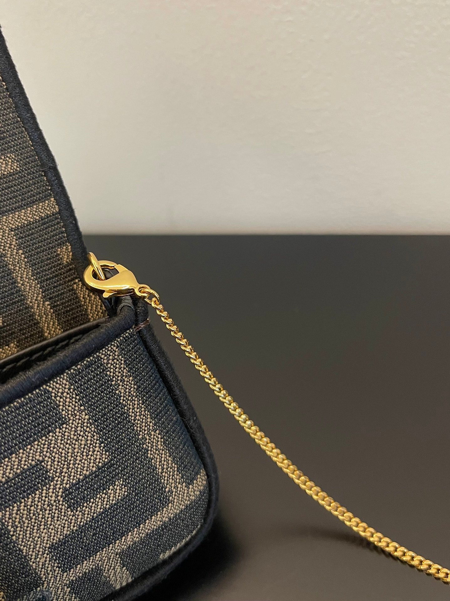 Fendi FF Canvas Nano Baguette Charm with Gold-Tone Ring Handle