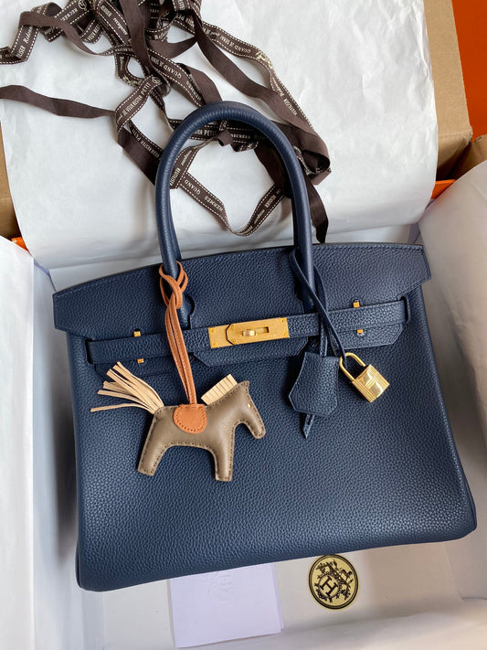Navy Blue Leather Top-Handle Handbag with Gold Hardware and Horse Charm