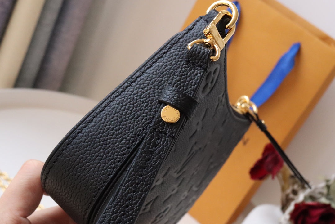 Louis Vuitton Monogram Empreinte Leather Pochette Accessoires - Black