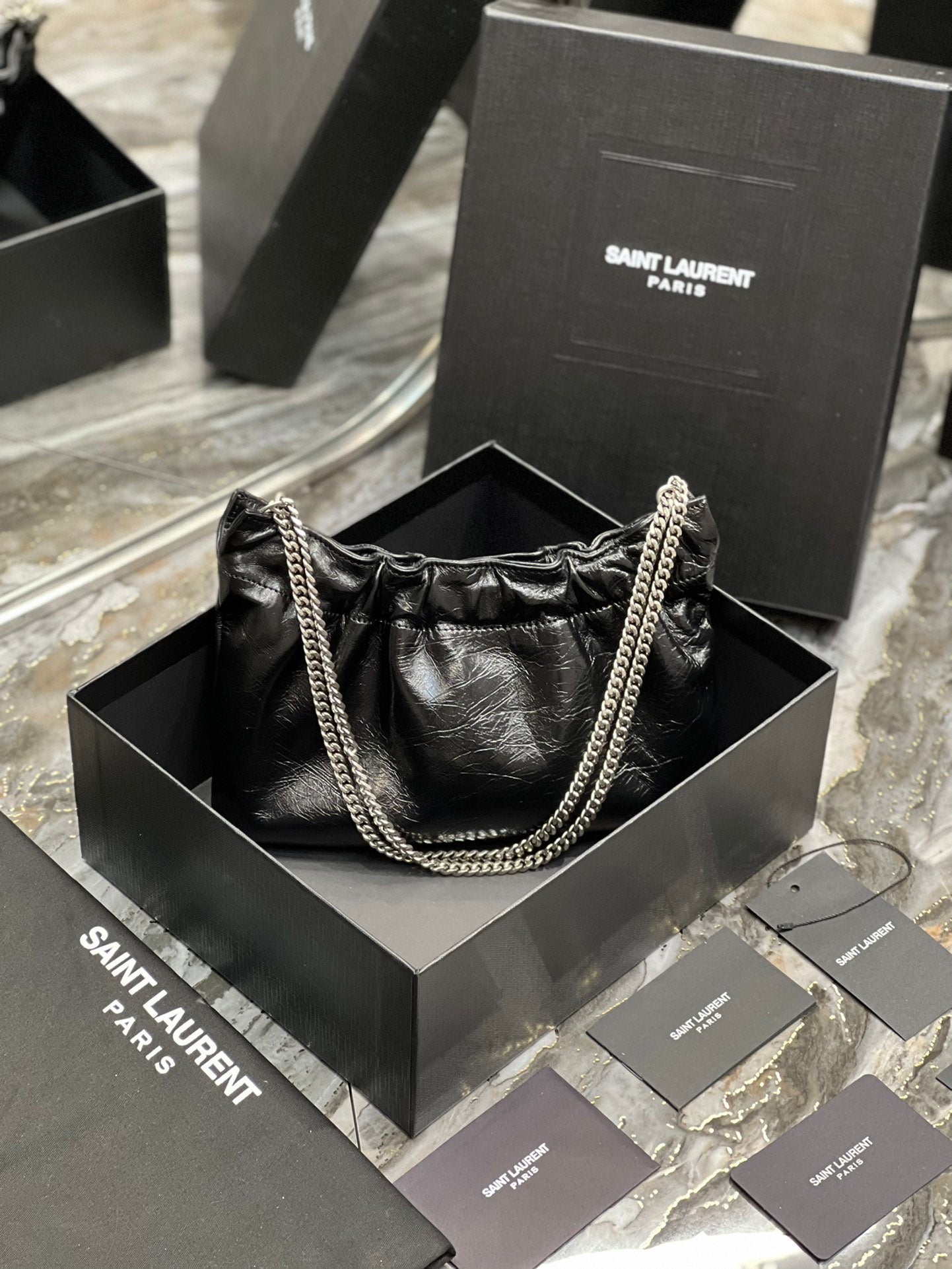Saint Laurent Black Leather Mini Pouch Bag with Silver Chain and YSL Charm