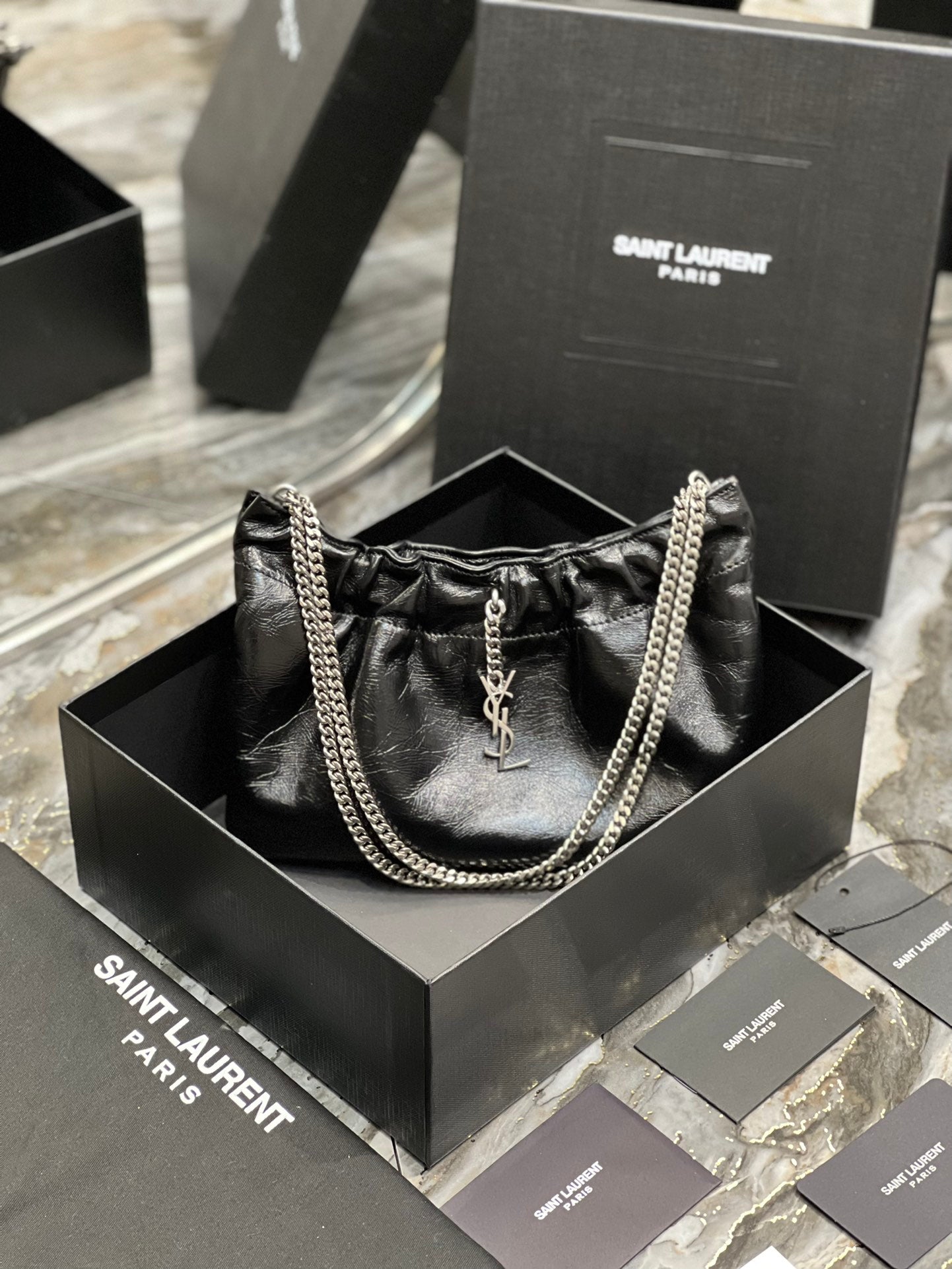 Saint Laurent Black Leather Mini Pouch Bag with Silver Chain and YSL Charm