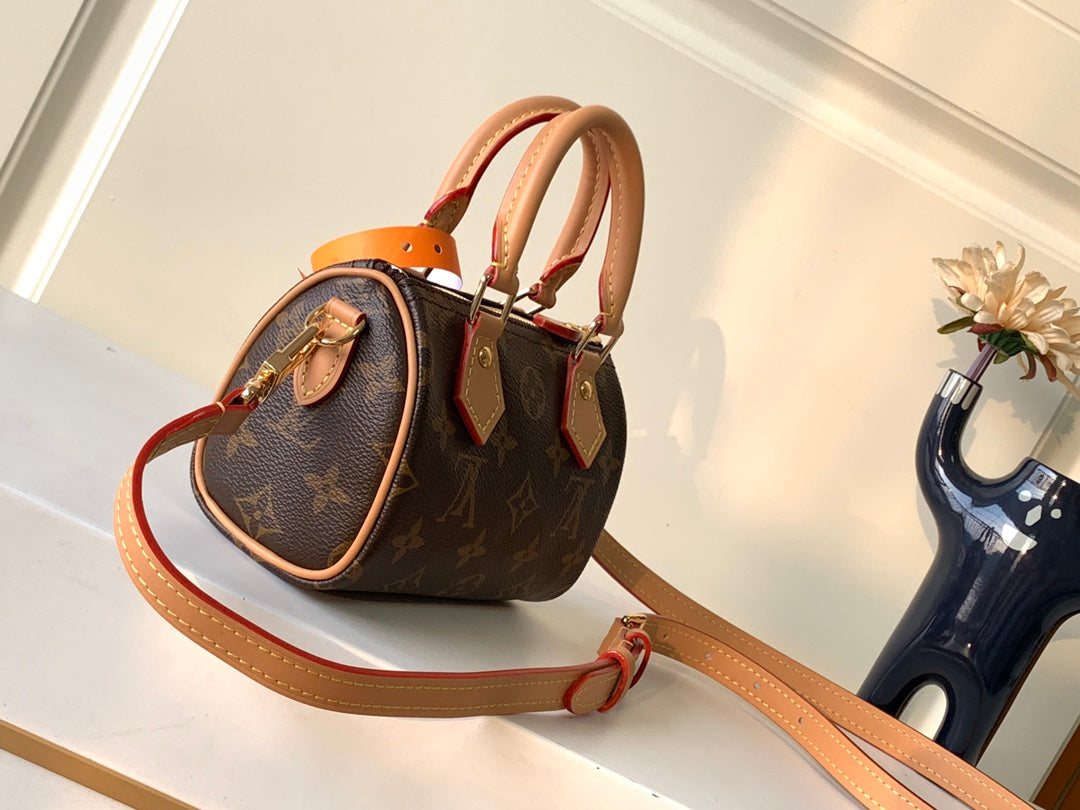 Louis Vuitton Classic Brown Monogram Mini Barrel Handbag with Leather Strap