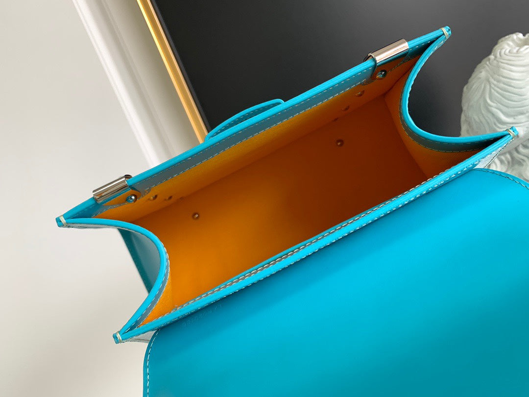 Gogy Turquoise Geometric Pattern Leather Handbag with Wooden Top Handle