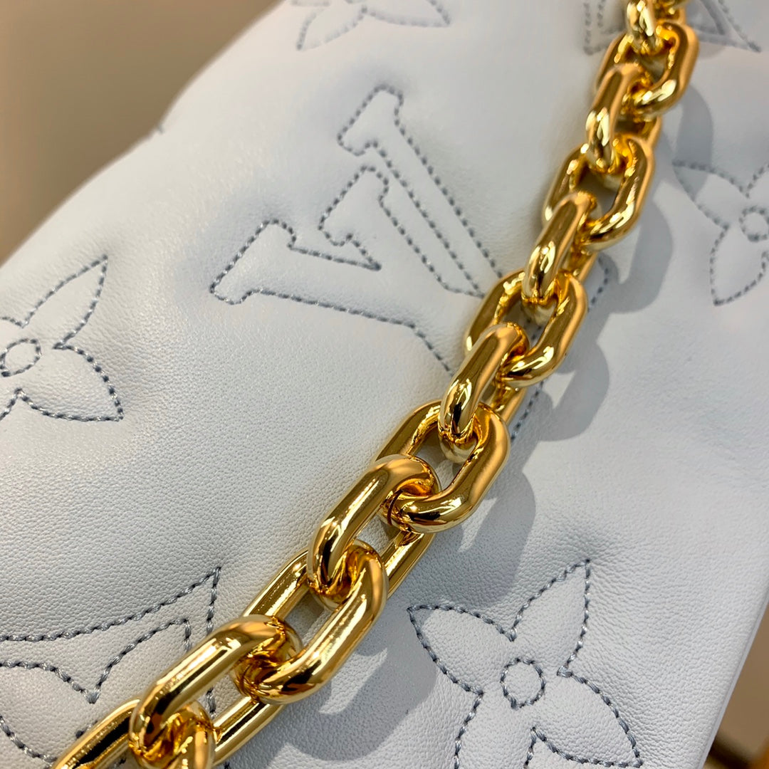Louis Vuitton Light Blue Embossed Crossbody Bag with Wide Strap and Gold Chain