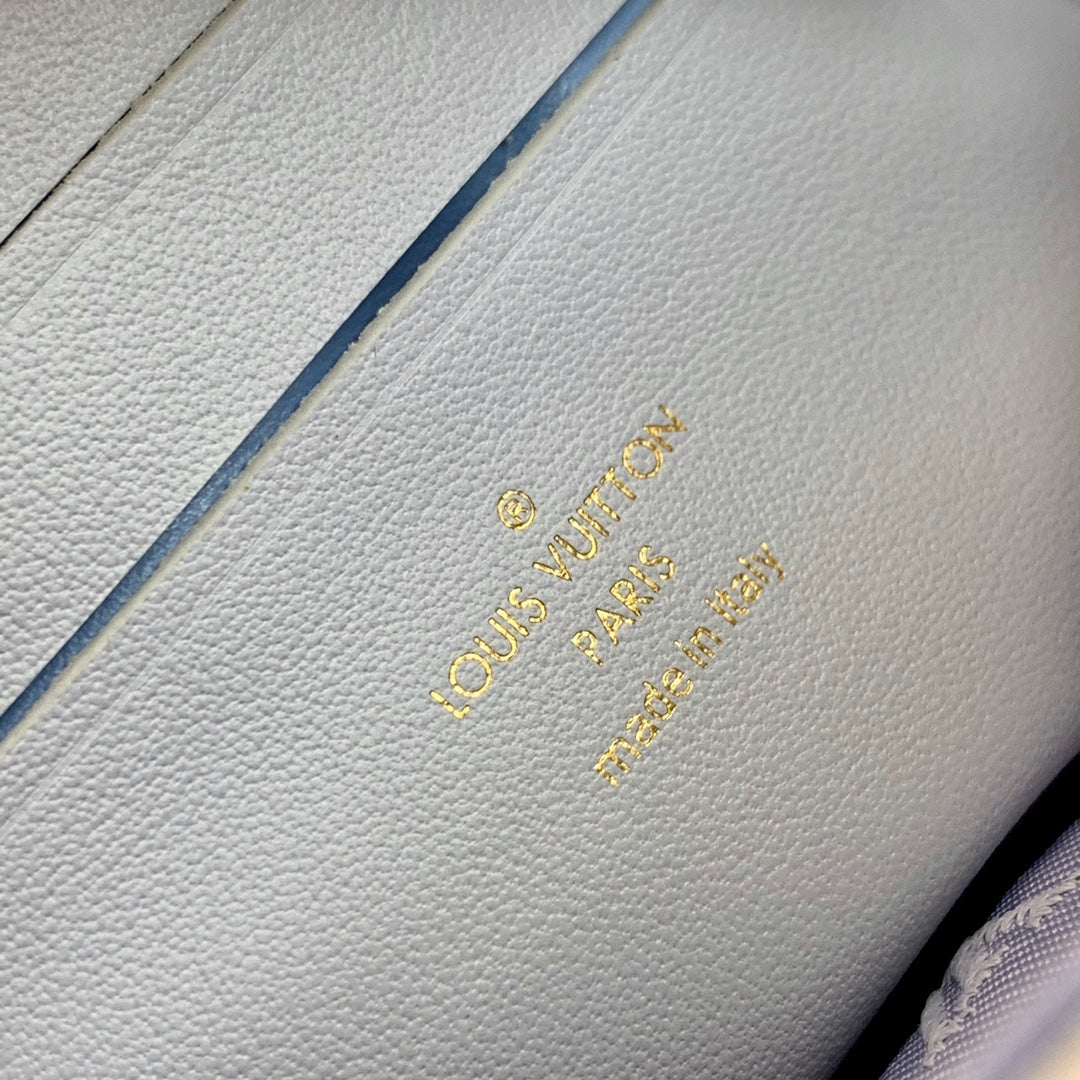 Louis Vuitton Light Blue Embossed Crossbody Bag with Wide Strap and Gold Chain