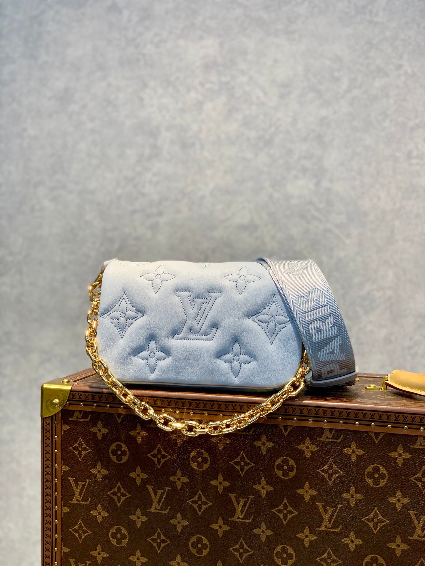 Louis Vuitton Light Blue Embossed Crossbody Bag with Wide Strap and Gold Chain
