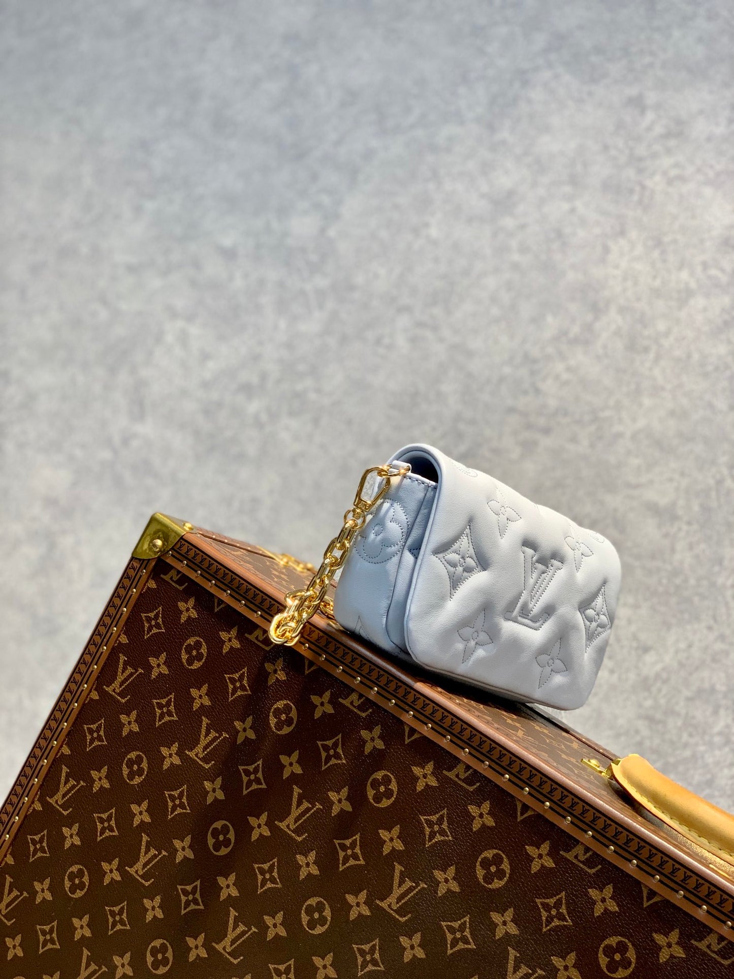 Louis Vuitton Light Blue Embossed Crossbody Bag with Wide Strap and Gold Chain