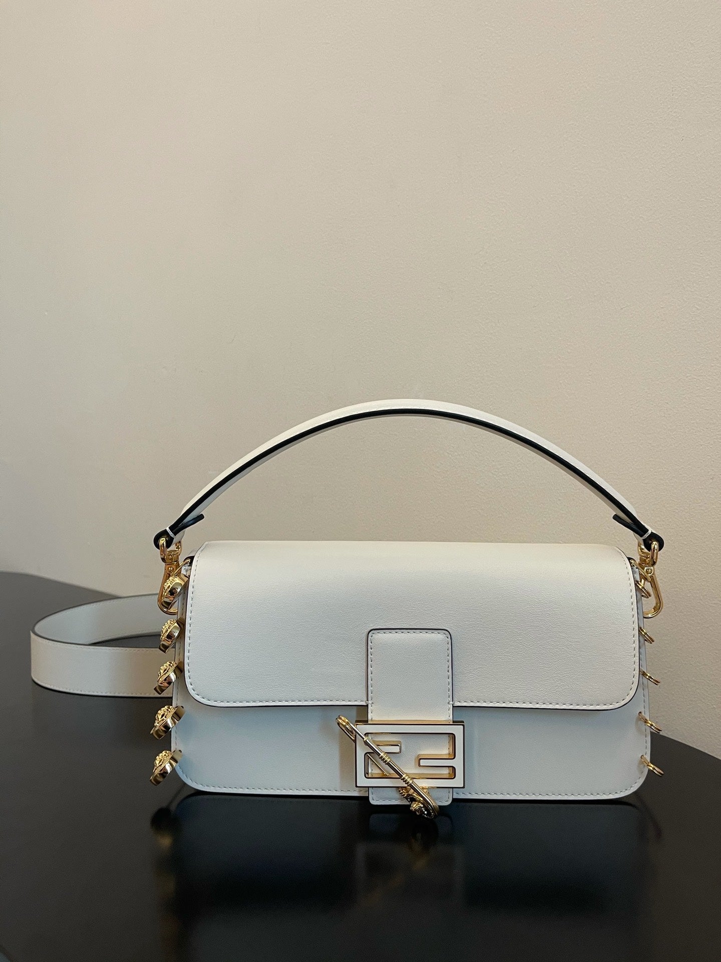 Fendi White Leather Baguette Bag with Gold-Tone Hardware and Detachable Strap