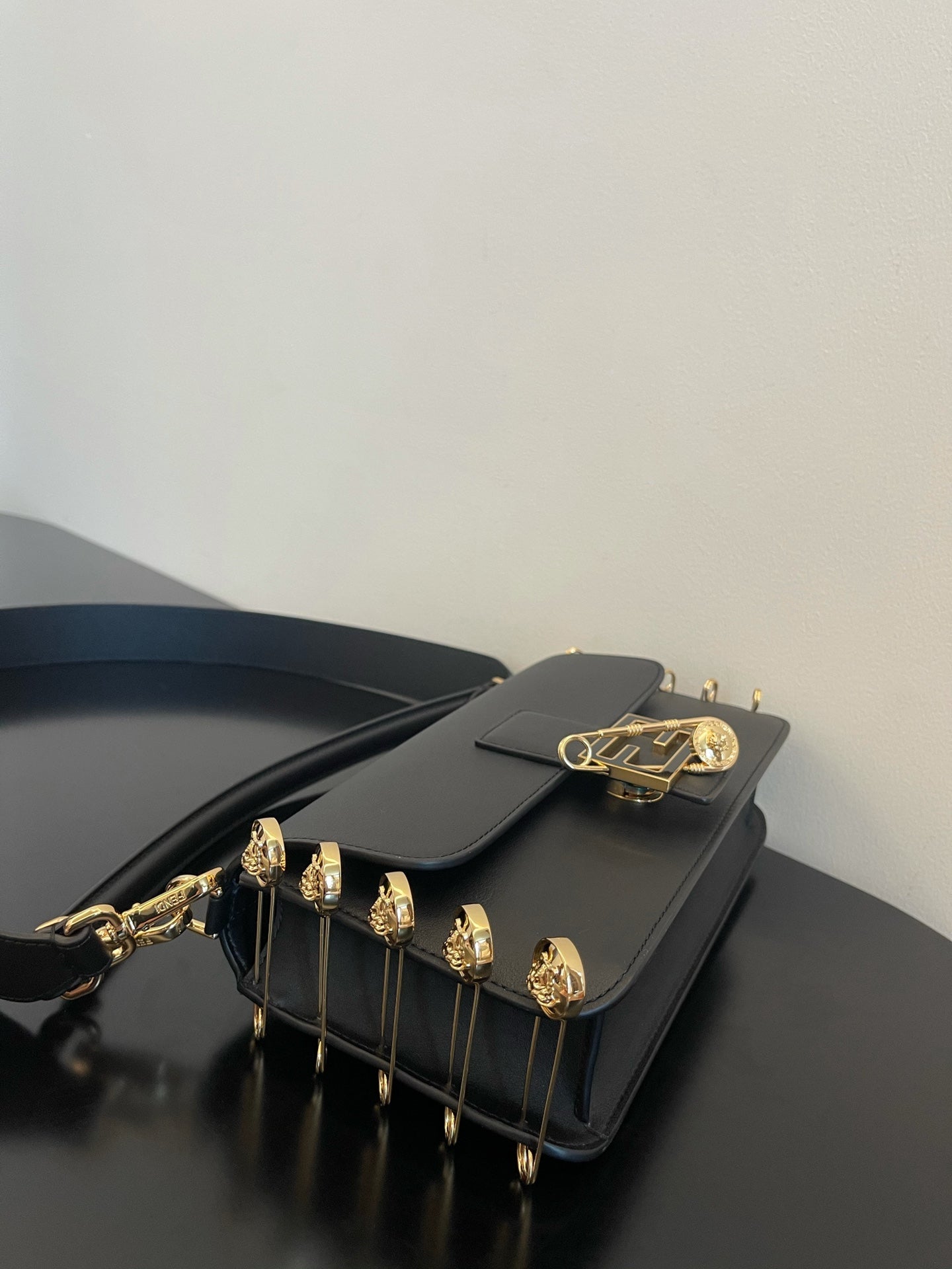 Black Leather Shoulder Bag with Gold Safety Pin Detail &amp; Studded Accents