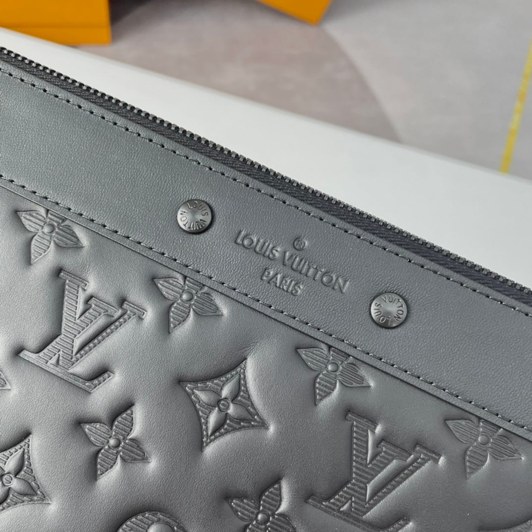 Louis Vuitton Elegant Black Embossed Monogram Leather Wristlet Clutch Bag