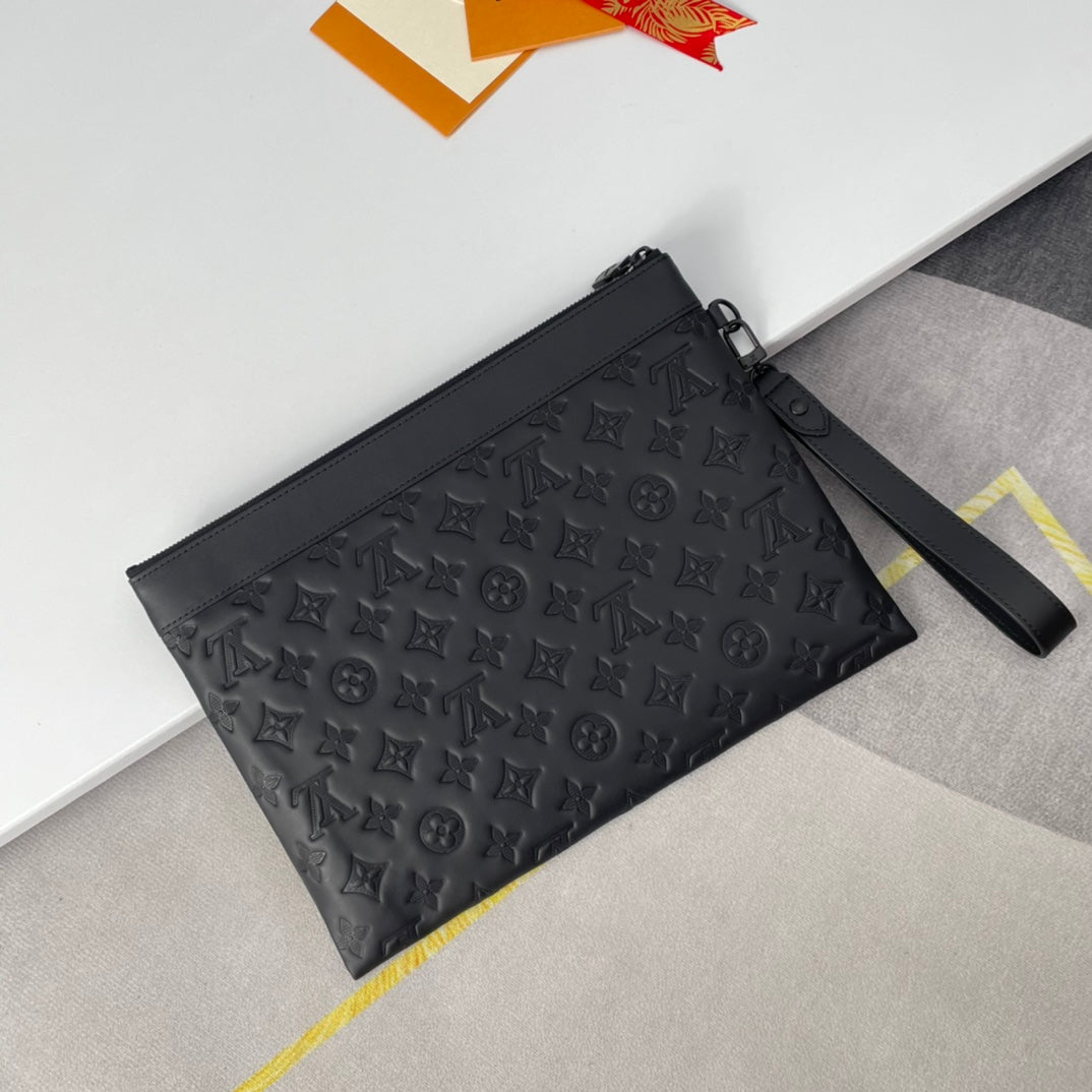 Louis Vuitton Elegant Black Embossed Monogram Leather Wristlet Clutch Bag