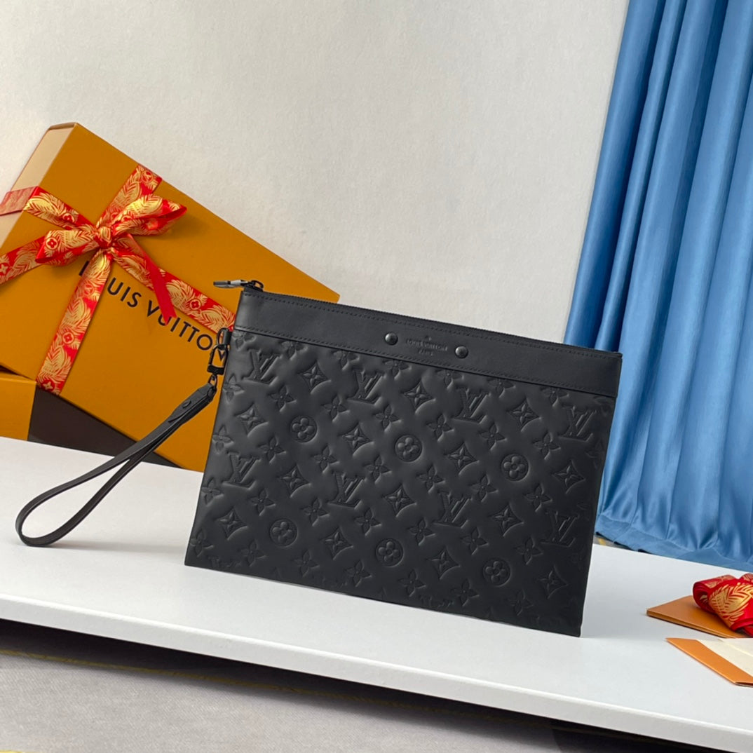 Louis Vuitton Elegant Black Embossed Monogram Leather Wristlet Clutch Bag