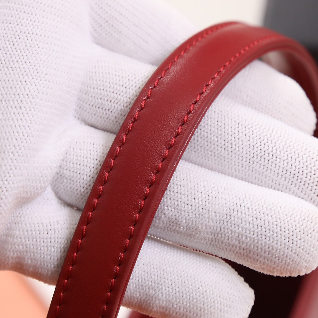 Red Textured Leather Accessory Detail - Stitched Mounting Loop