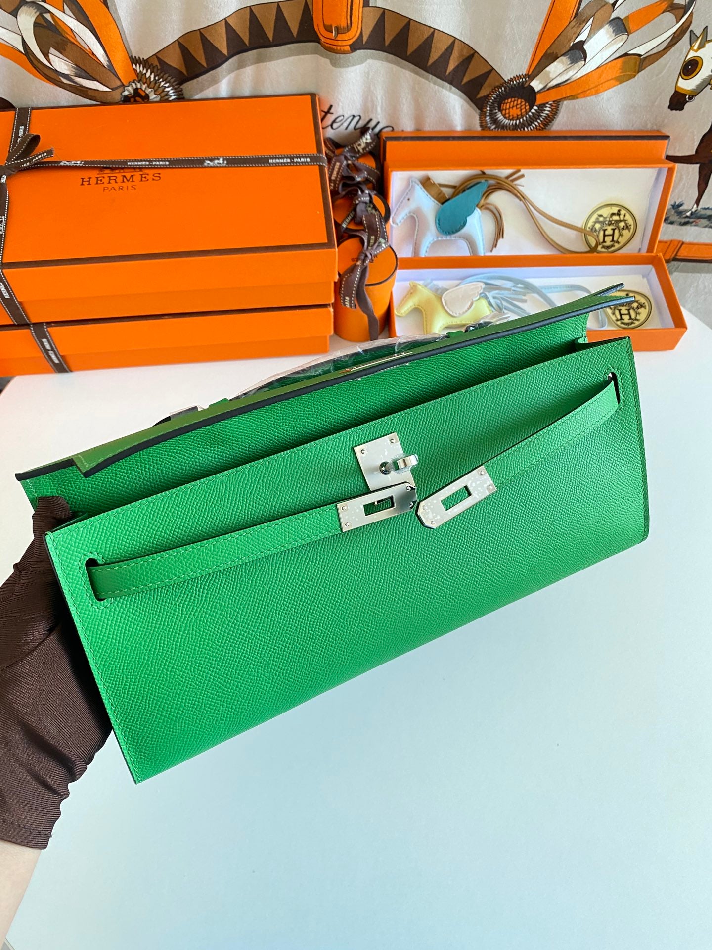 Hermès Kelly Cut Clutch Bag in Vibrant Green Leather with Silver Hardware
