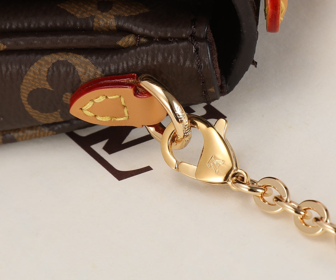 Louis Vuitton Brown Monogram Patterned Mini Crossbody Bag with Gold Chain