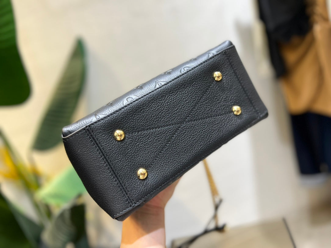 Louis Vuitton Elegant Black Embossed Shoulder Bag with Gold Chain Strap