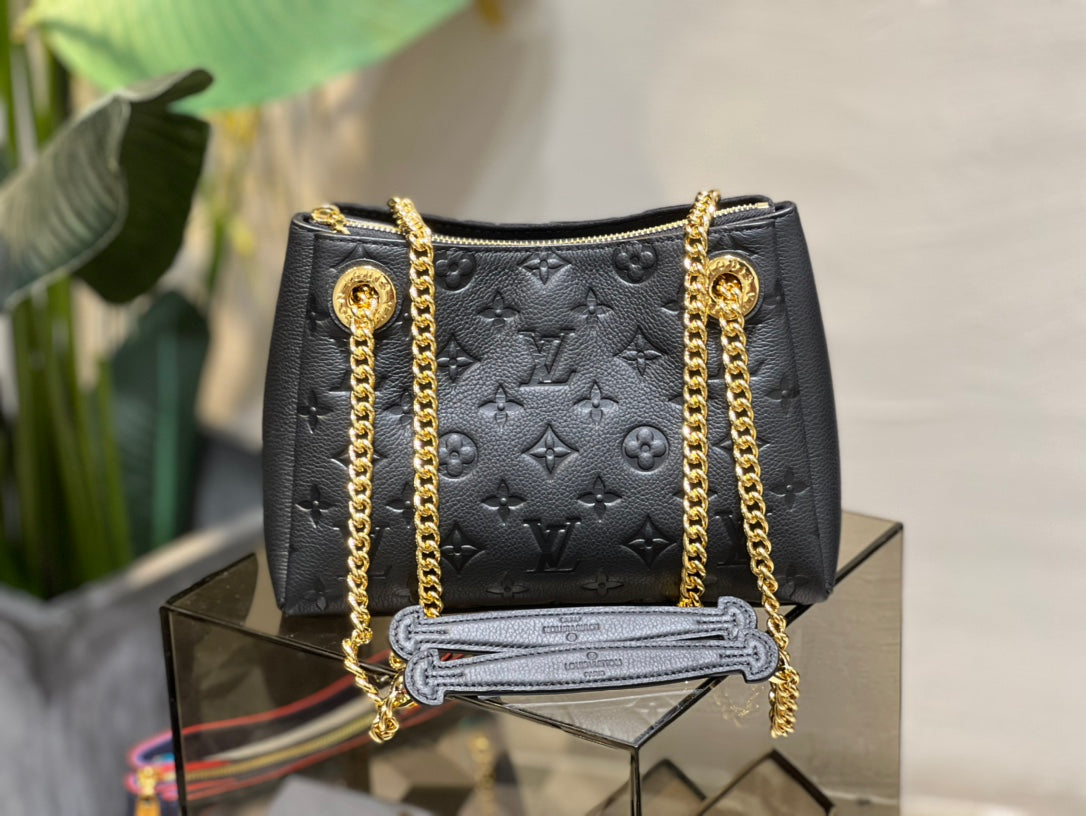 Louis Vuitton Elegant Black Embossed Shoulder Bag with Gold Chain Strap