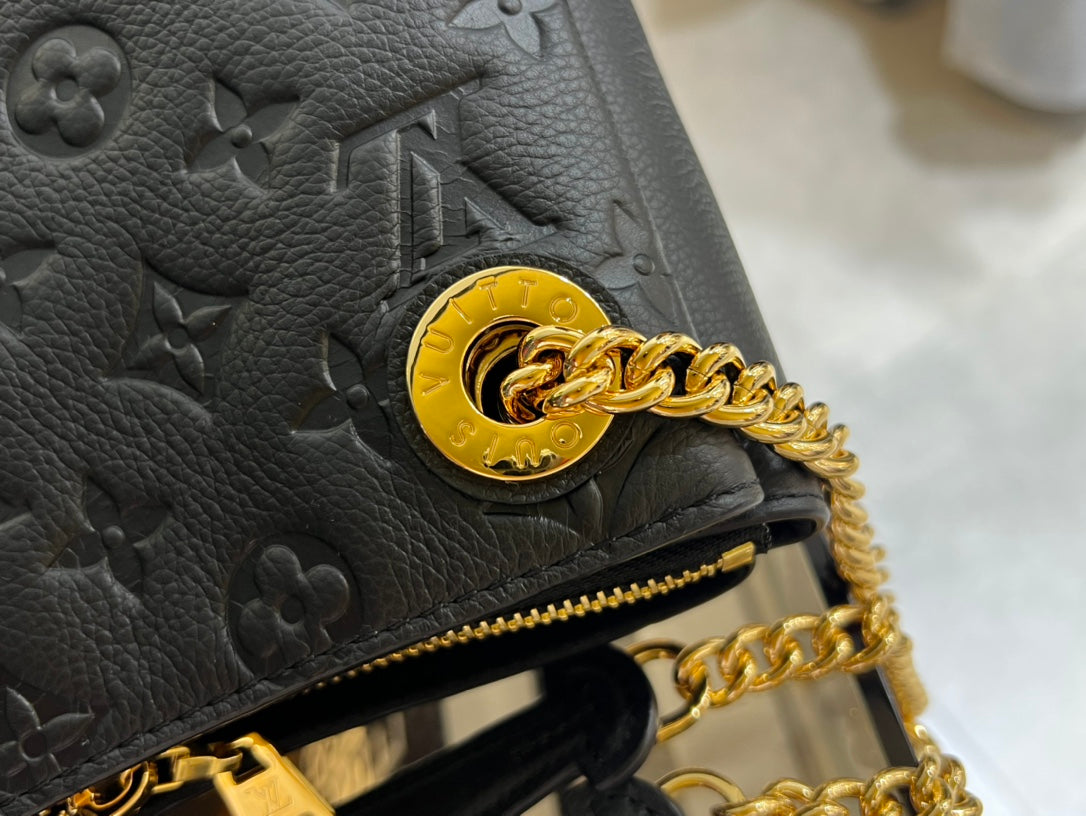 Louis Vuitton Elegant Black Embossed Shoulder Bag with Gold Chain Strap