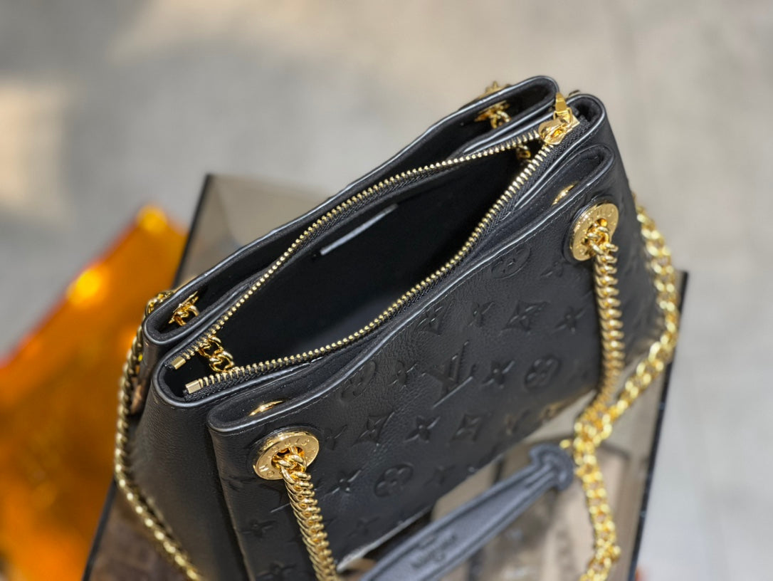 Louis Vuitton Elegant Black Embossed Shoulder Bag with Gold Chain Strap