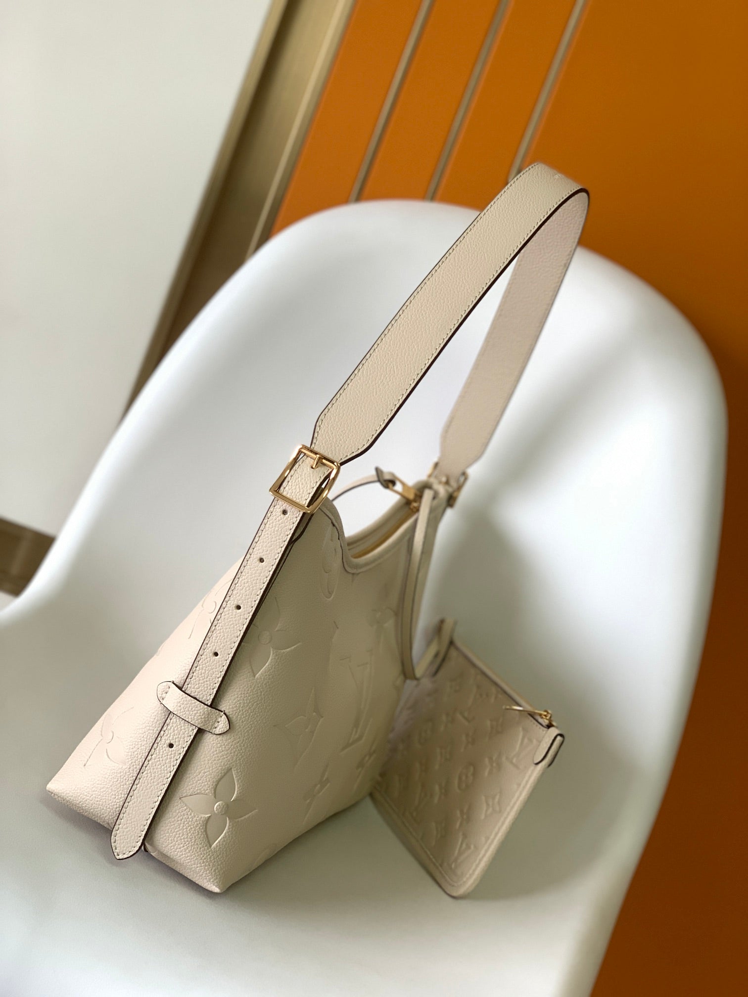 Louis Vuitton Elegant Beige Embossed Leather Shoulder Bag with Hanging Tag