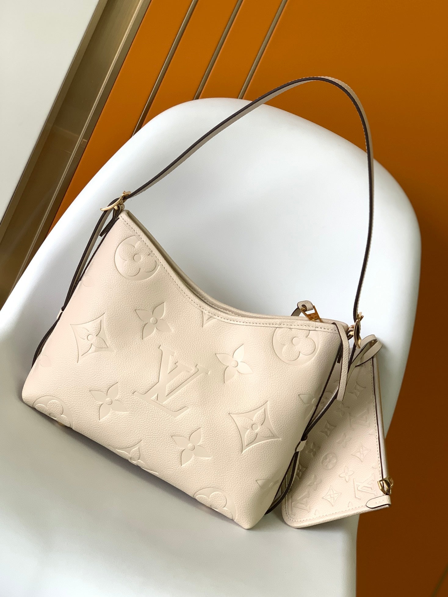 Louis Vuitton Elegant Beige Embossed Leather Shoulder Bag with Hanging Tag
