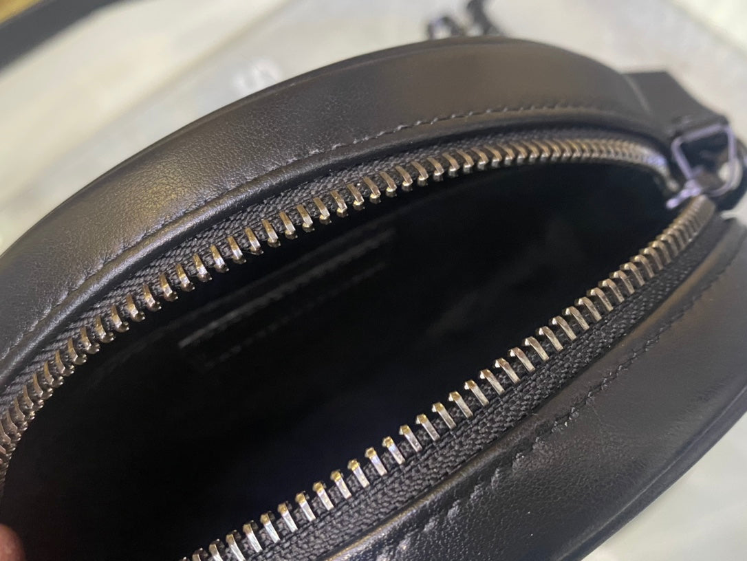 Saint Laurent Vinyle Round Camera Bag in Matelassé Grain de Poudre Embossed Leather