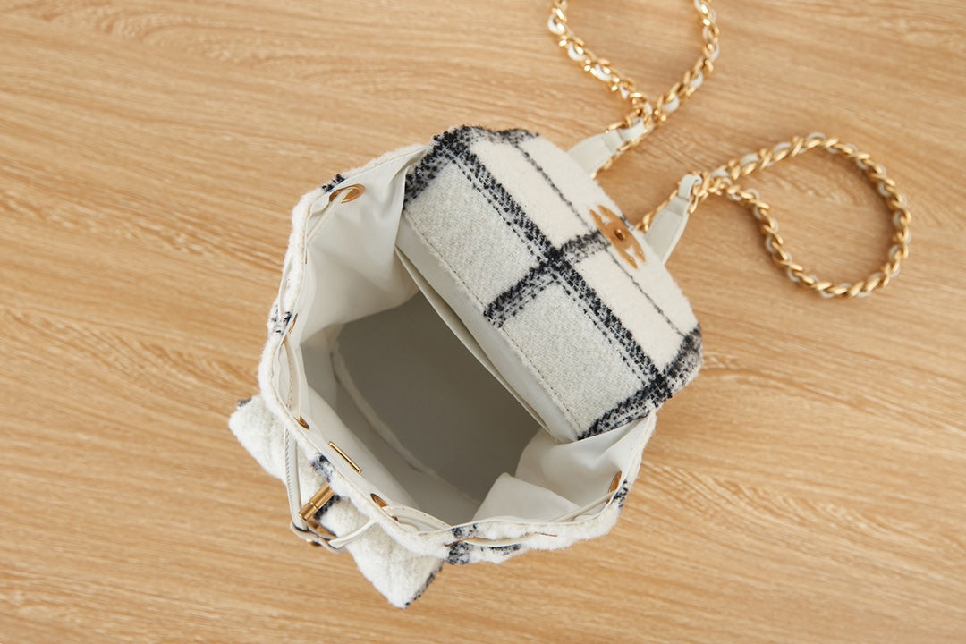 Elegant White and Black Quilted Tweed Mini Backpack with Gold Chain Straps