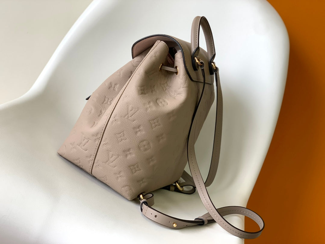 Louis Vuitton Elegant Taupe Embossed Leather Mini Backpack with Flap Closure